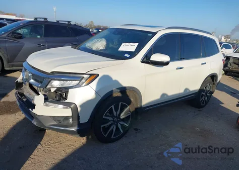 2019 Honda Pilot Elite z USA, uszkodzony, nr VIN 5FNYF6H09KB055155